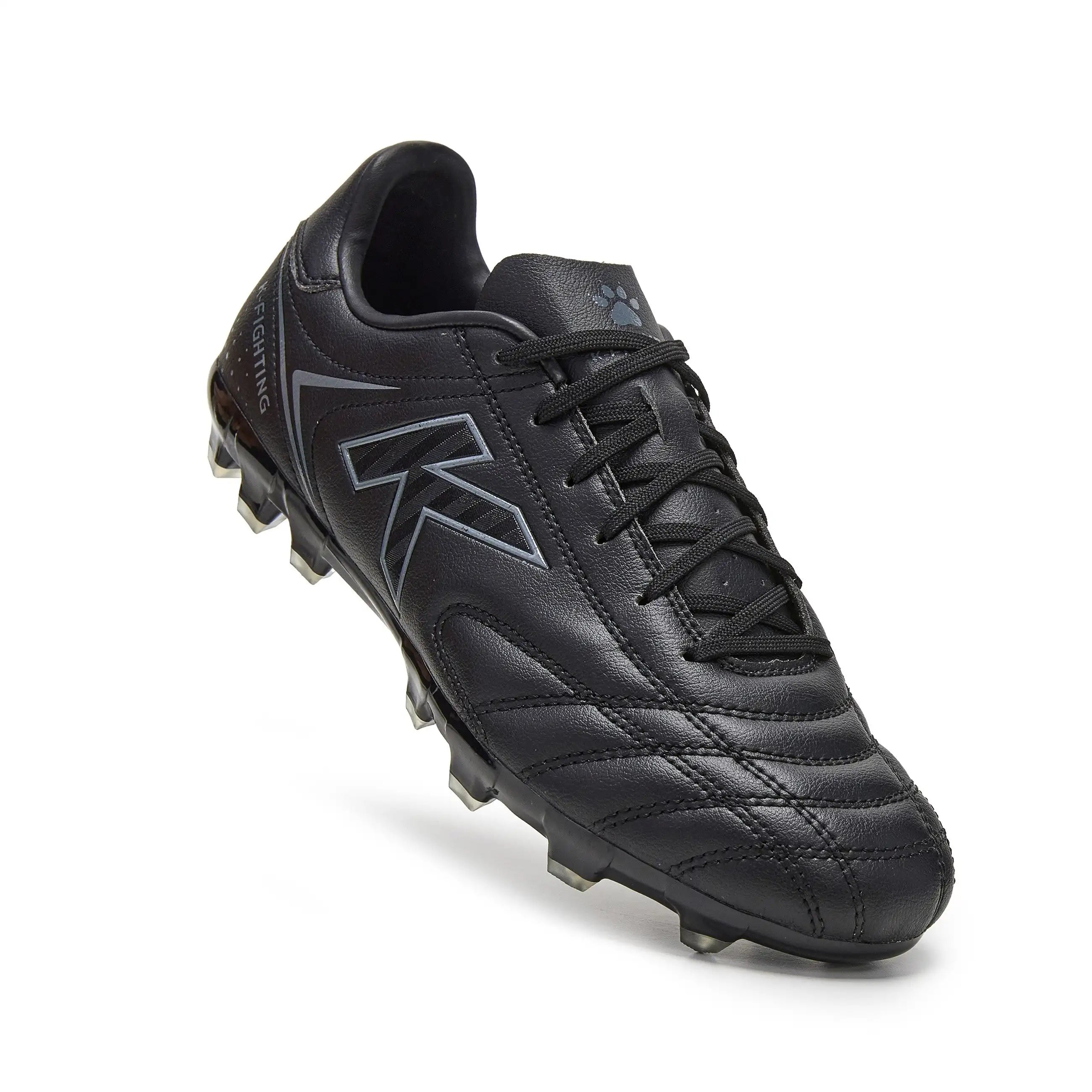 Kelme New Millenia Black Soccer Boots - 100% synthetic leather, modern design, lightweight for speed, with traction technology for optimal grip, perfect for players of all levels in Spring/Summer 2025.