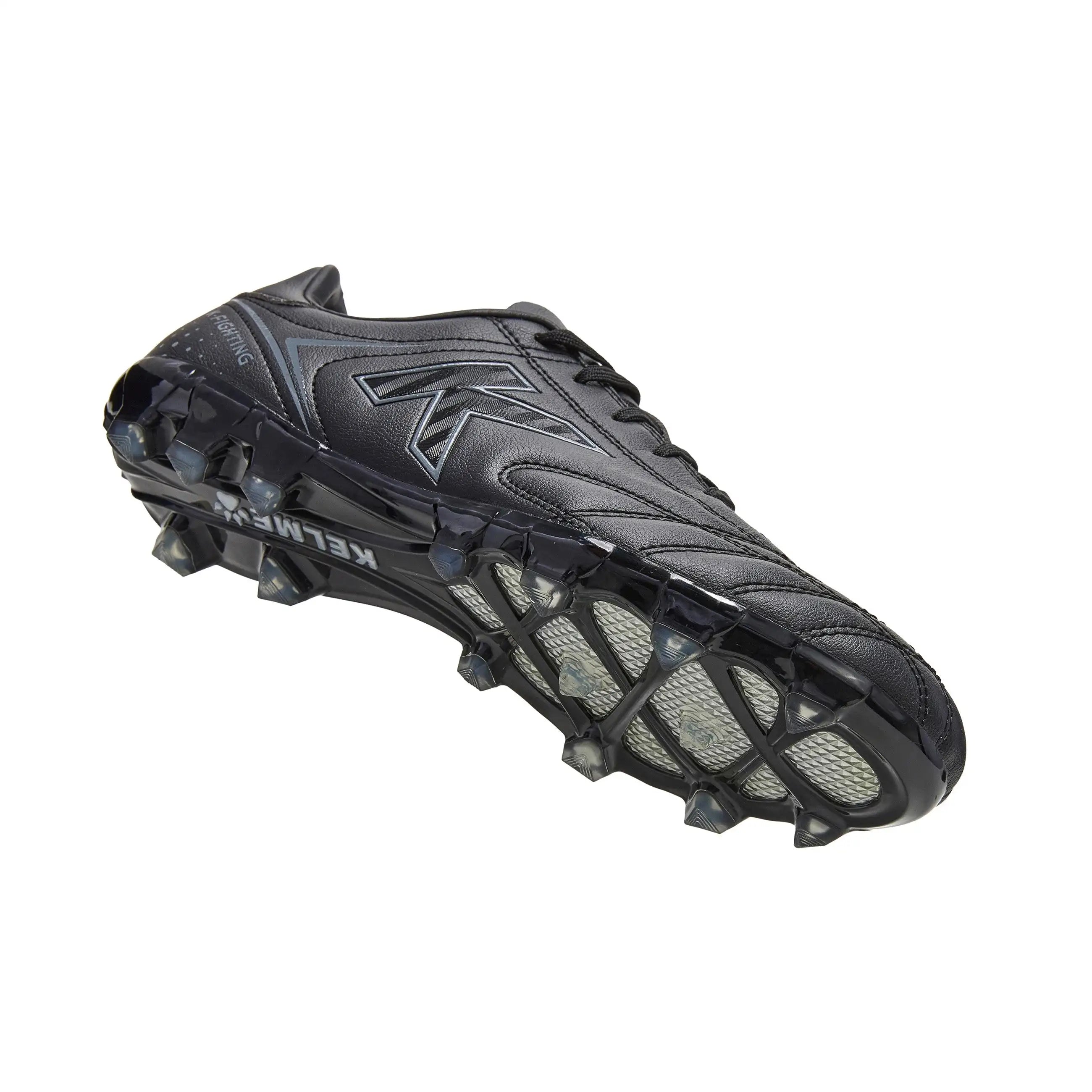 Kelme New Millenia Black Soccer Boots - 100% synthetic leather, modern design, lightweight for speed, with traction technology for optimal grip, perfect for players of all levels in Spring/Summer 2025.