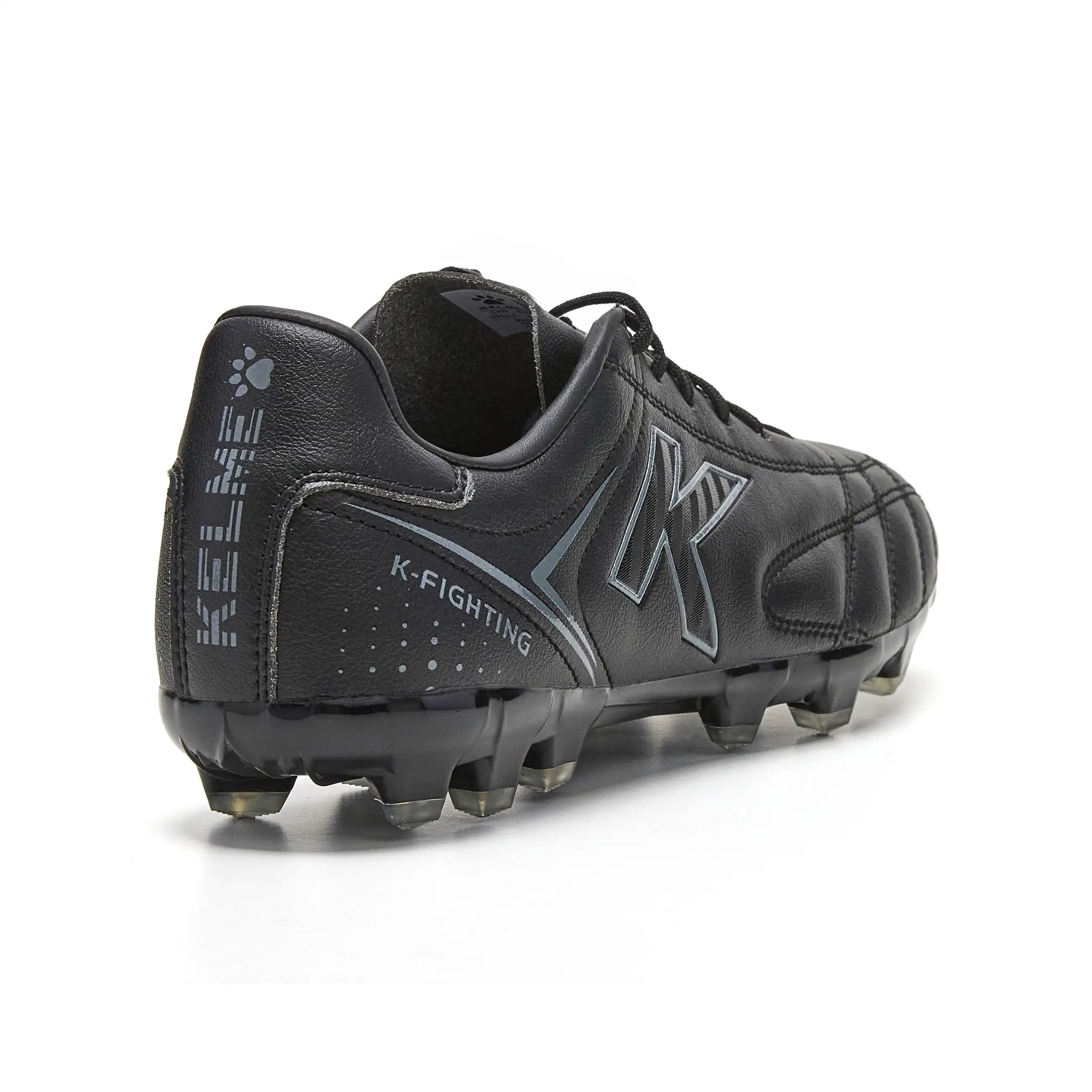 Kelme New Millenia Black Soccer Boots - 100% synthetic leather, modern design, lightweight for speed, with traction technology for optimal grip, perfect for players of all levels in Spring/Summer 2025.