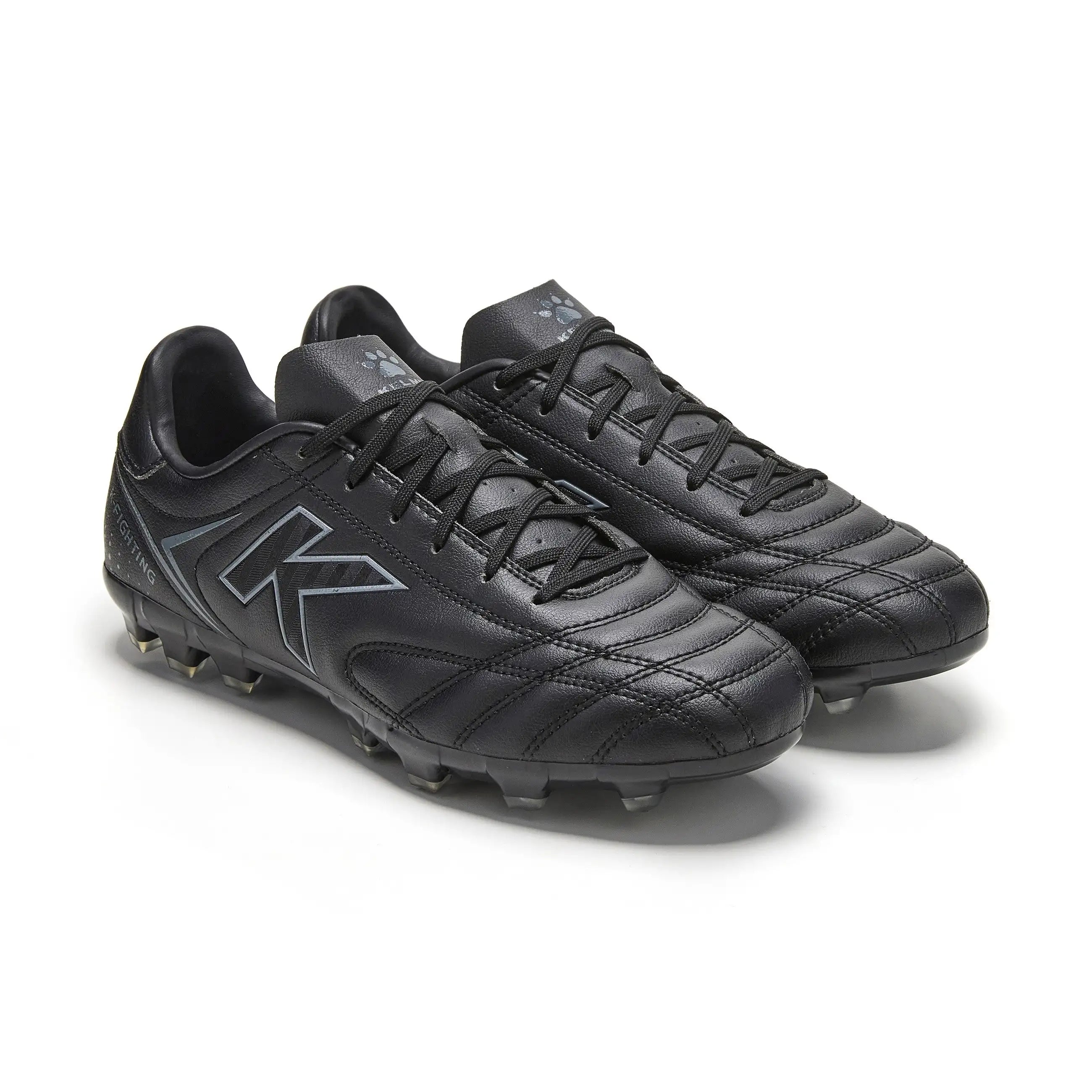 Kelme New Millenia Black Soccer Boots - 100% synthetic leather, modern design, lightweight for speed, with traction technology for optimal grip, perfect for players of all levels in Spring/Summer 2025.