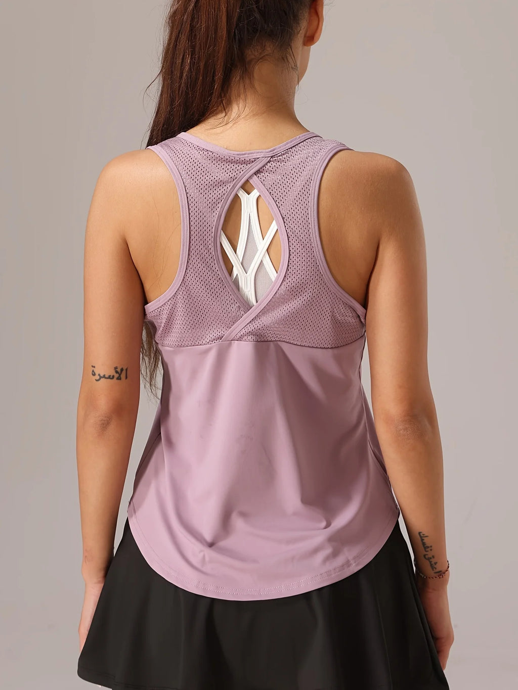 Camiseta deportiva sin mangas para mujer - Espalda de malla y diseño cruzado